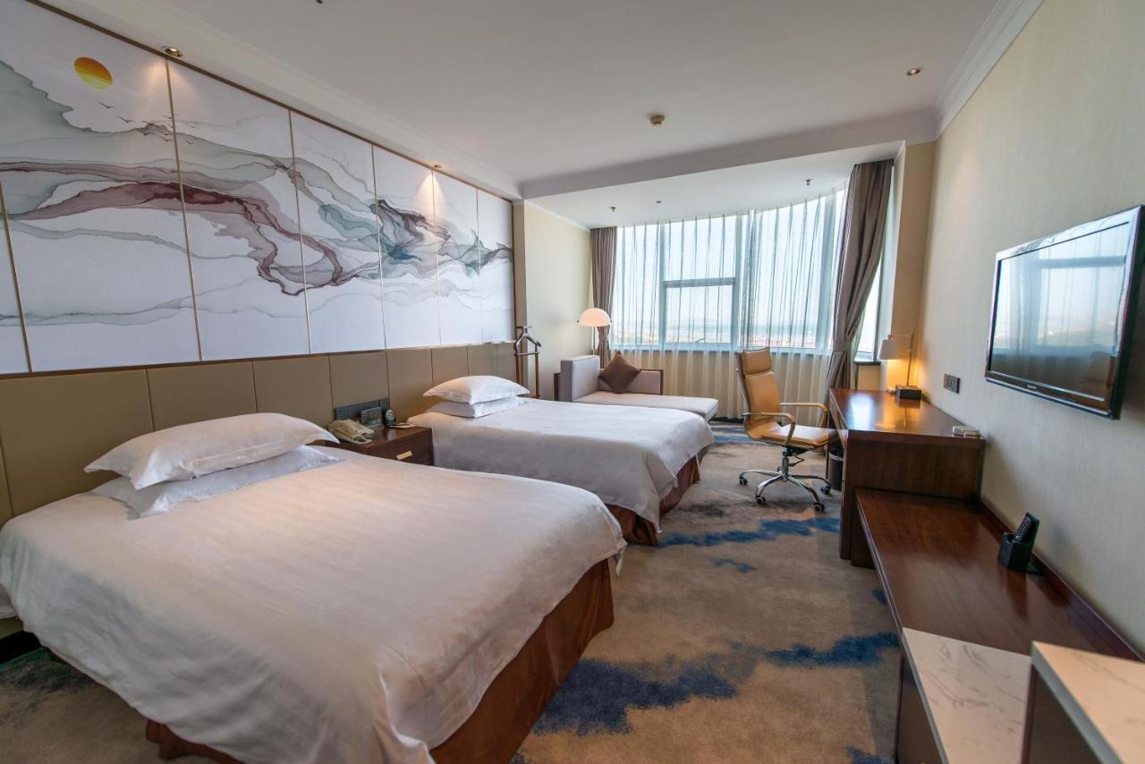 Yantai Jinghai Hotel Extérieur photo